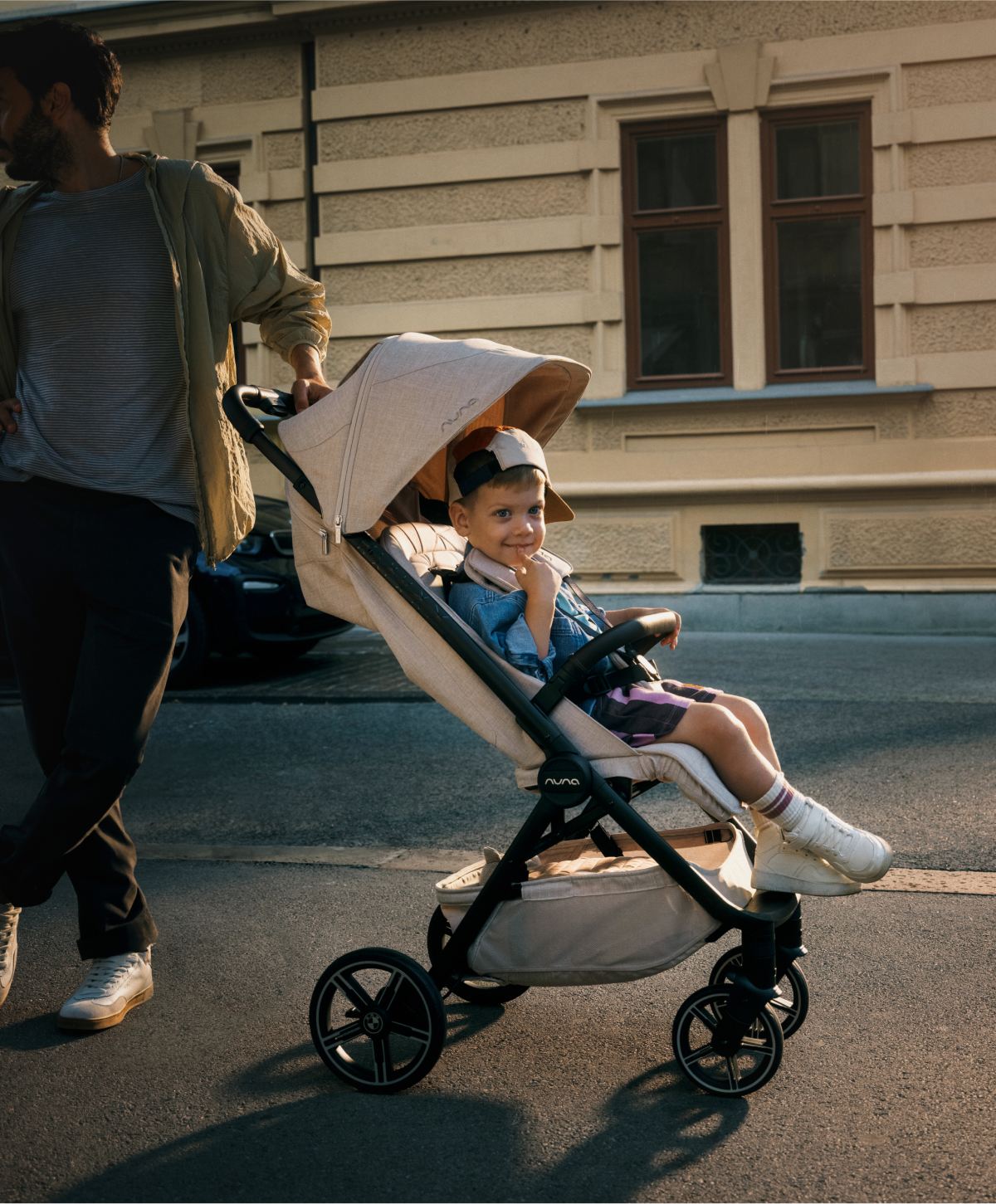 child in BMW TRVL lx stroller